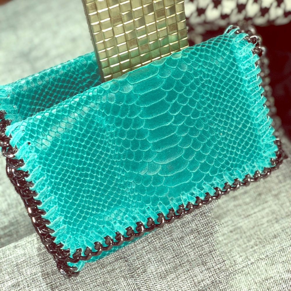 Teal clutch !! Never worn! With strap or No strap